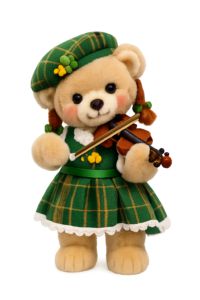 Eine Bärin in schottischer Tracht mit Geige.